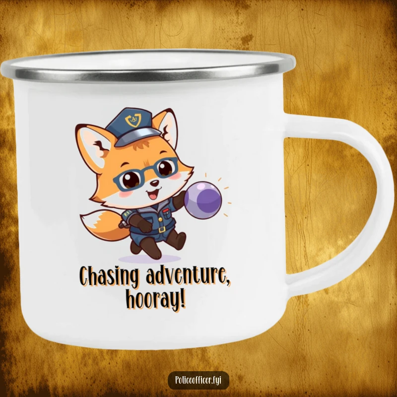 Funny enamel camping mug with a playful fox cub police officer chasing a bouncing ball. Durable and humorous outdoor drinkware.
