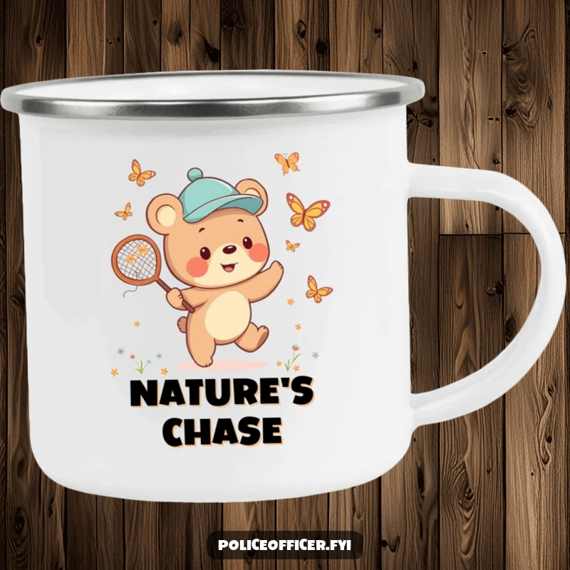 Funny Bear Cub Camping Mug with a cheerful cub wearing a jaunty cap, happily chasing butterflies with a net, ideal for outdoor drinks.