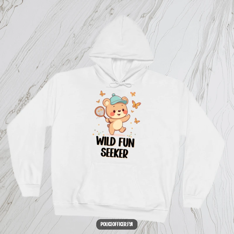 Funny Bear Cub Hoodie displaying a cheerful cub in a jaunty cap, happily chasing butterflies with a net, exuding playful optimism.