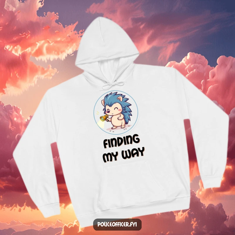 Funny Hoodie featuring a brave hedgehog in a small badge, holding a miniature flashlight and scanning the ground, perfect for cozy investigations.